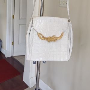 Crocodile style white handbag